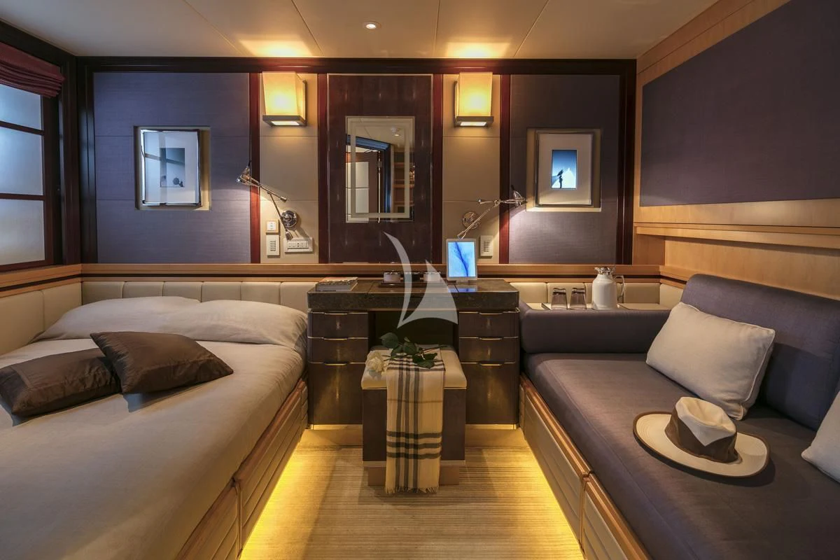 a room with a couch and a coffee table aboard PEGASUS Yacht for Charter