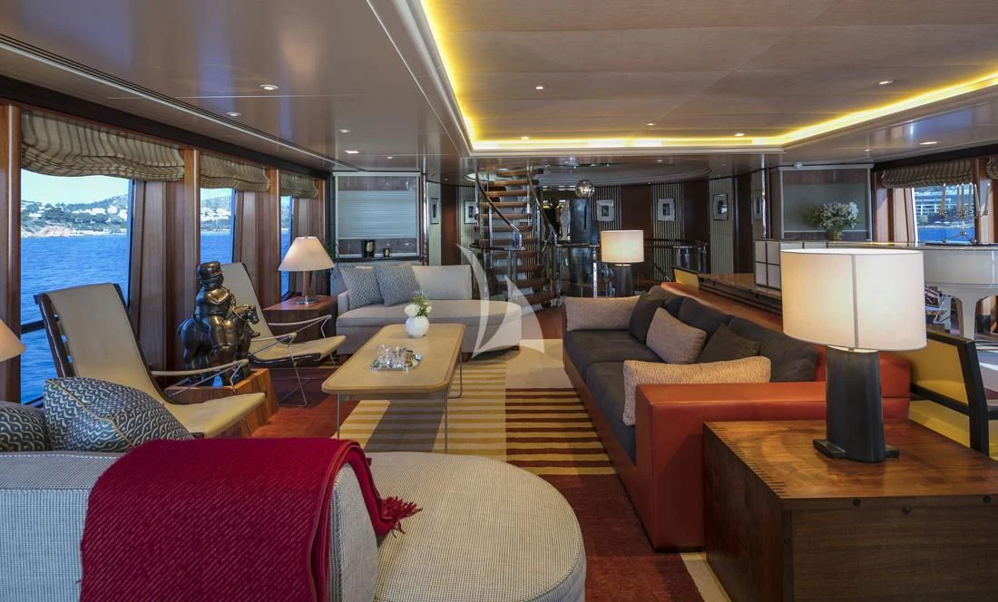 a living room with a ladder aboard PEGASUS Yacht for Charter