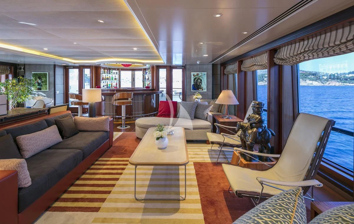 a living room with a large window aboard PEGASUS Yacht for Charter