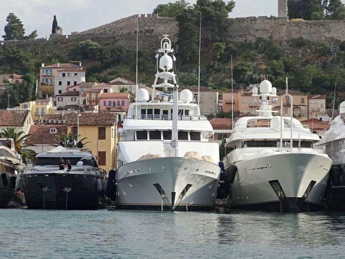 a group of boats in the water aboard PEGASUS Yacht for Charter