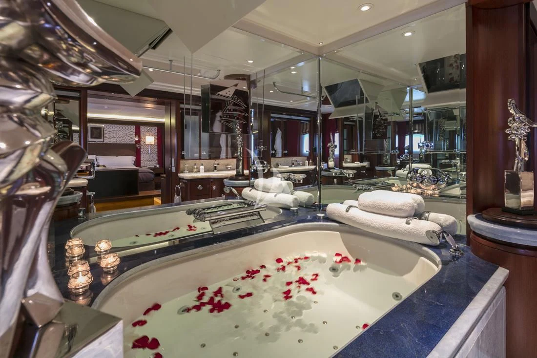 a room with a table and chairs aboard PEGASUS Yacht for Charter