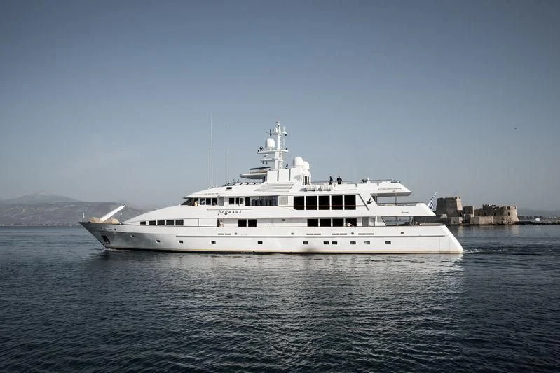 a large white boat in the water aboard PEGASUS Yacht for Charter