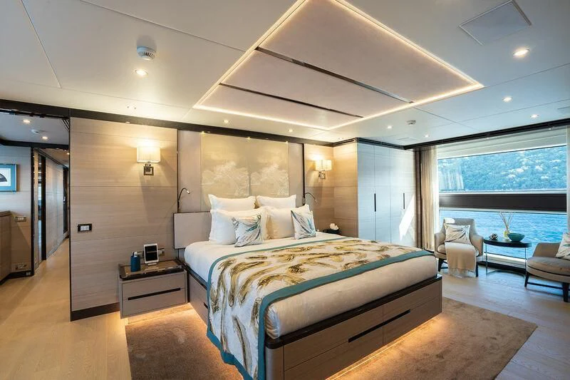 a large bedroom with a large bed aboard ELIZABETH Yacht for Sale