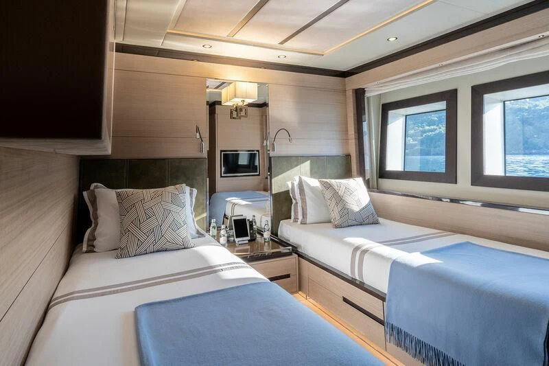 a couple of beds in a room aboard ELIZABETH Yacht for Sale