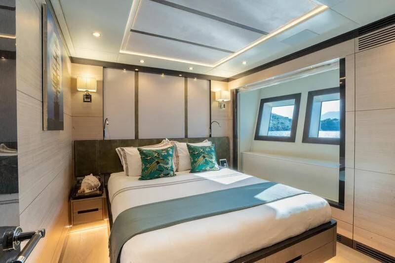 a bedroom with a bed aboard ELIZABETH Yacht for Sale