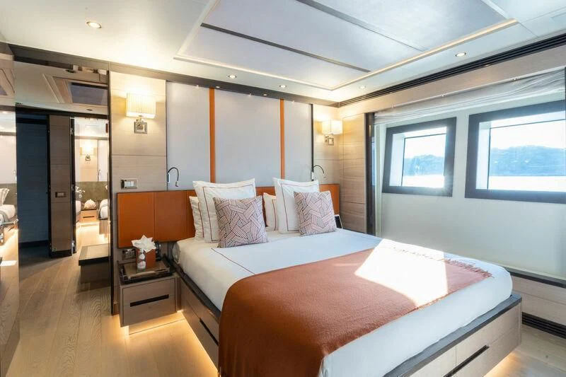 a bedroom with a bed aboard ELIZABETH Yacht for Sale