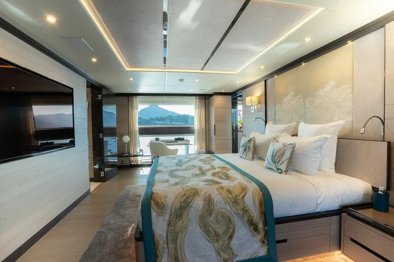 a bedroom with a large bed aboard ELIZABETH Yacht for Sale
