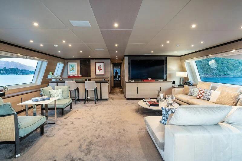 a living room with a large television aboard ELIZABETH Yacht for Sale
