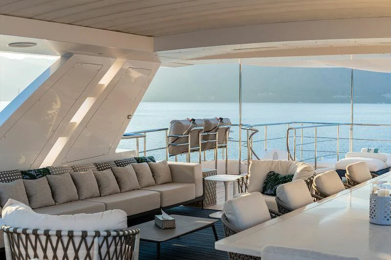 a living room with a large balcony aboard ELIZABETH Yacht for Sale