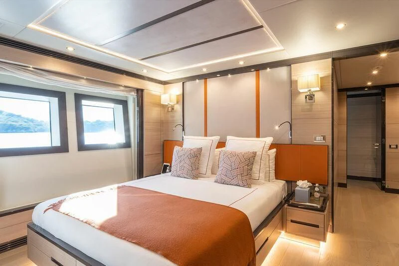 a large bedroom with a large bed aboard ELIZABETH Yacht for Sale