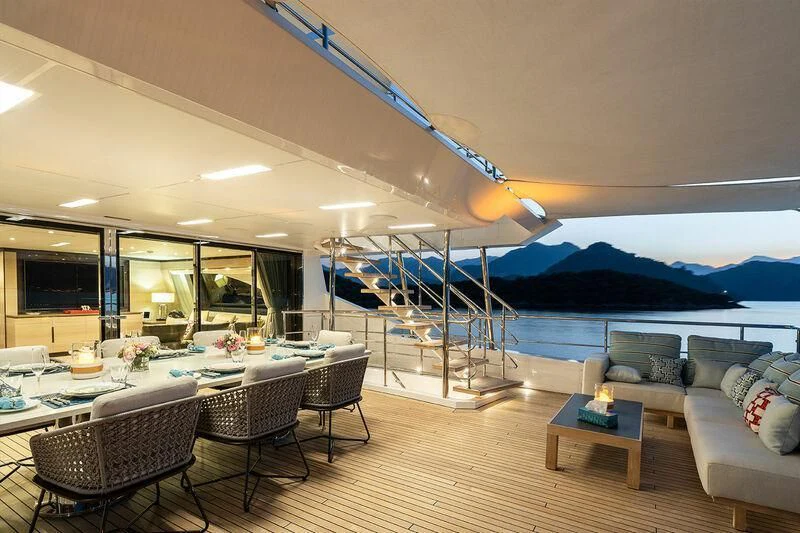a living room with a large swimming pool aboard ELIZABETH Yacht for Sale