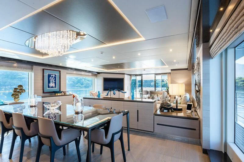 a large kitchen with a dining table aboard ELIZABETH Yacht for Sale
