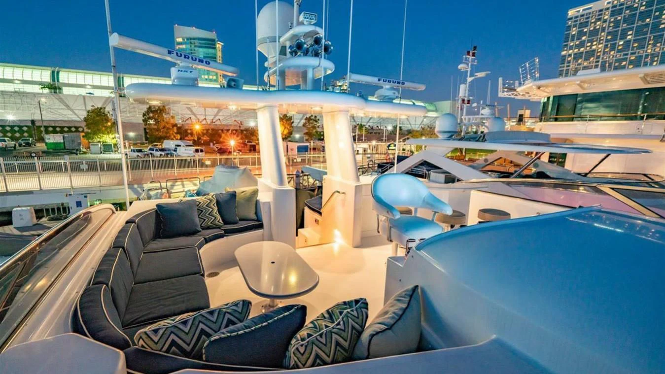 a large room with a view of the water and a city aboard SNOWBORED Yacht for Sale