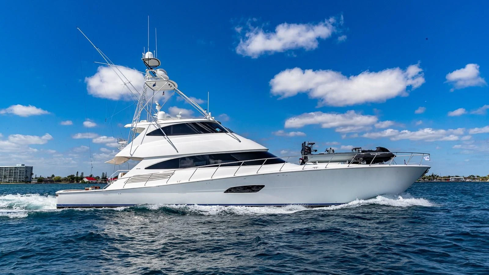 a white yacht on the water aboard AUSSIE RULES Yacht for Sale