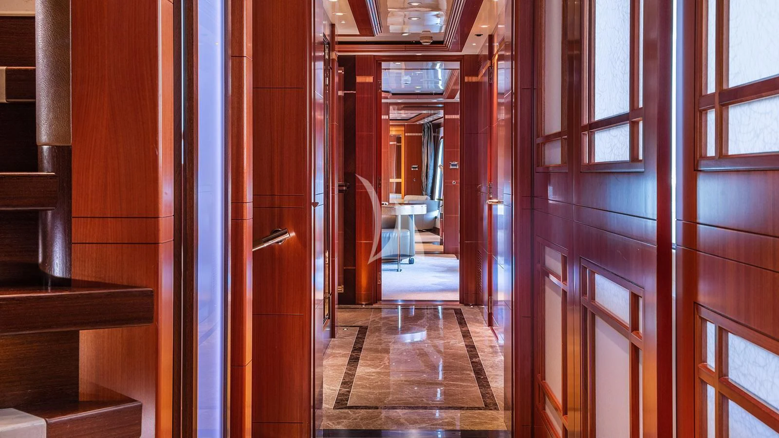 a hallway with wood doors aboard RARE FIND Yacht for Charter