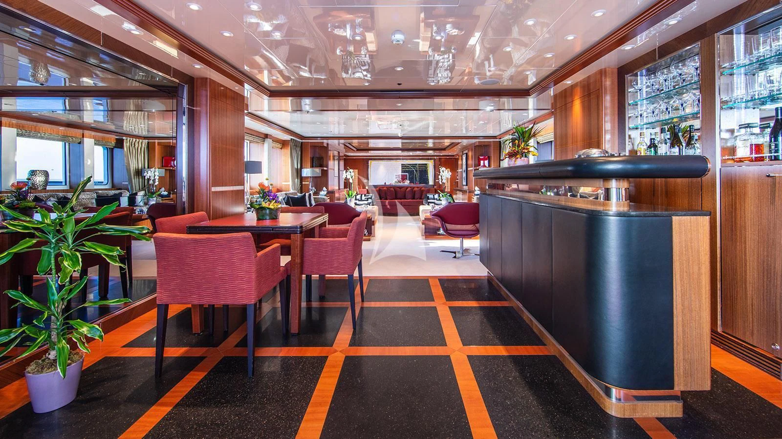 a room with a table and chairs aboard RARE FIND Yacht for Charter