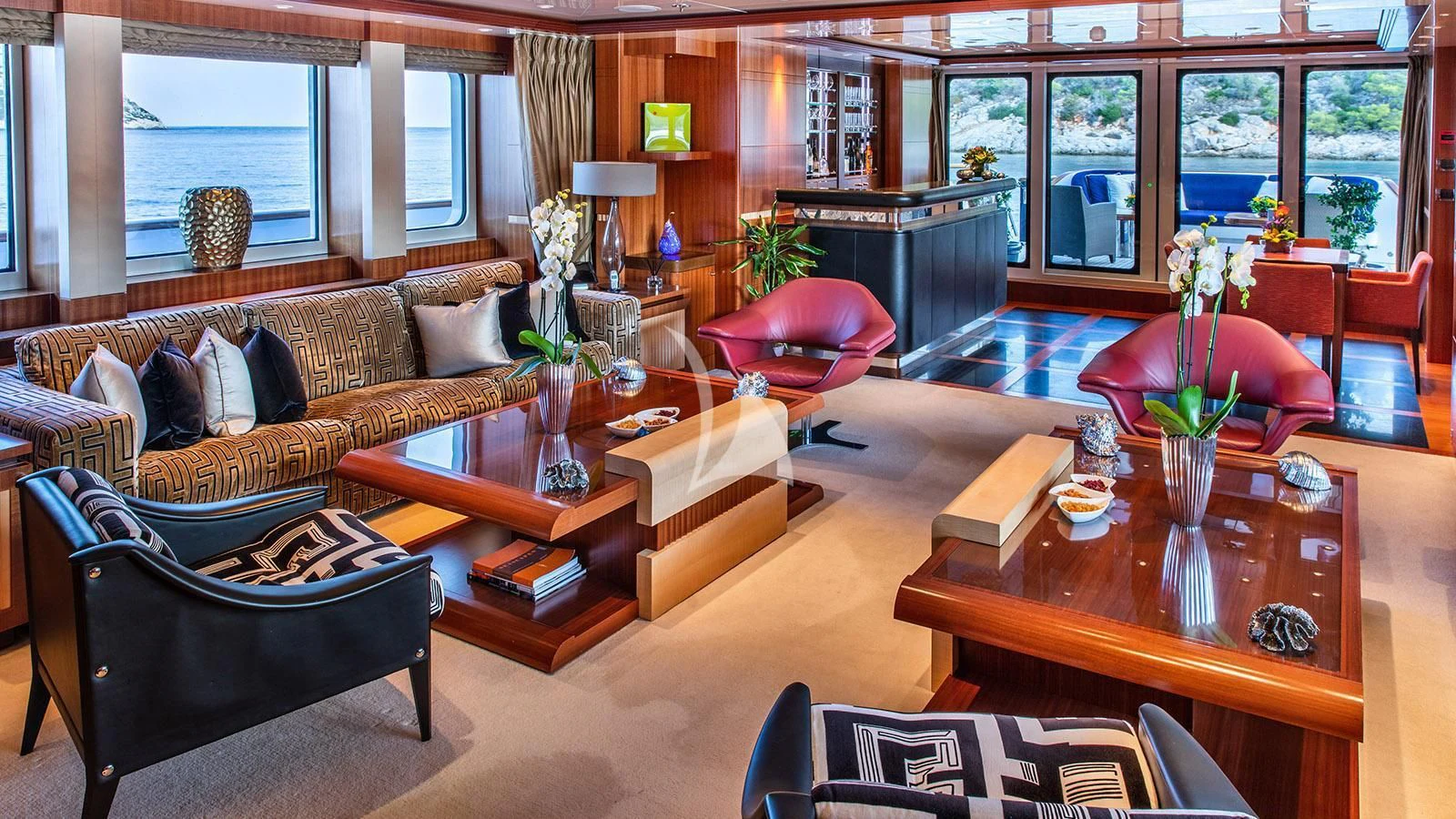 a living room with a table and chairs aboard RARE FIND Yacht for Charter