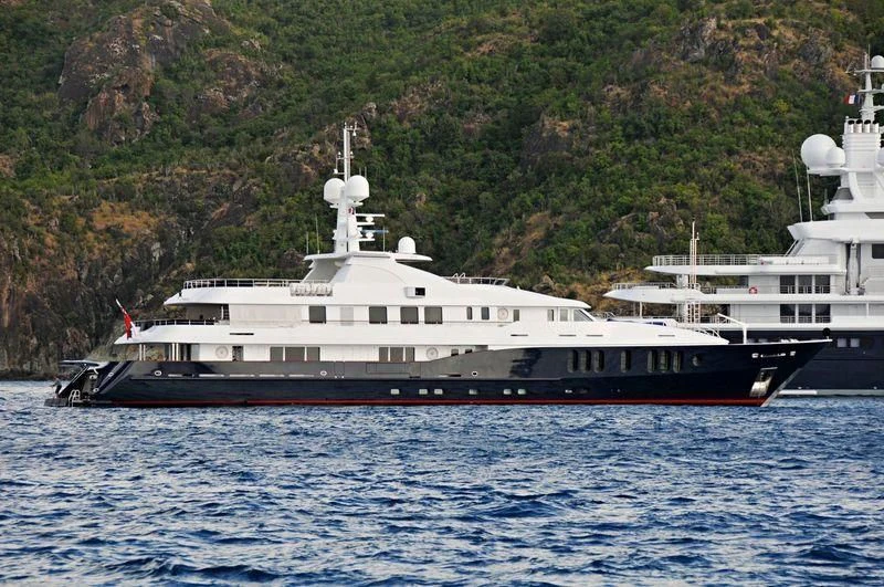 a large ship in the water aboard RARE FIND Yacht for Charter