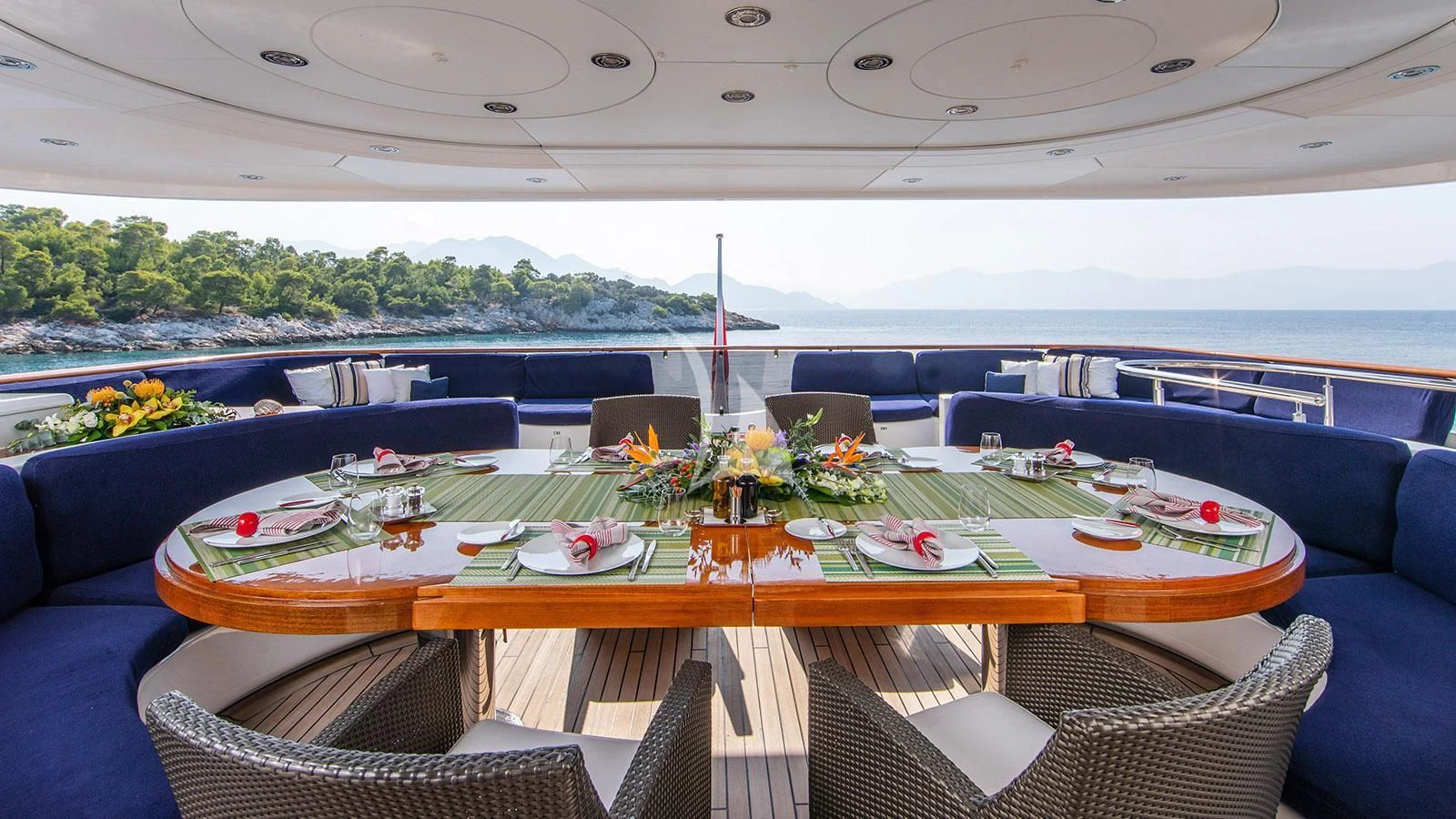 a table on a deck aboard RARE FIND Yacht for Charter