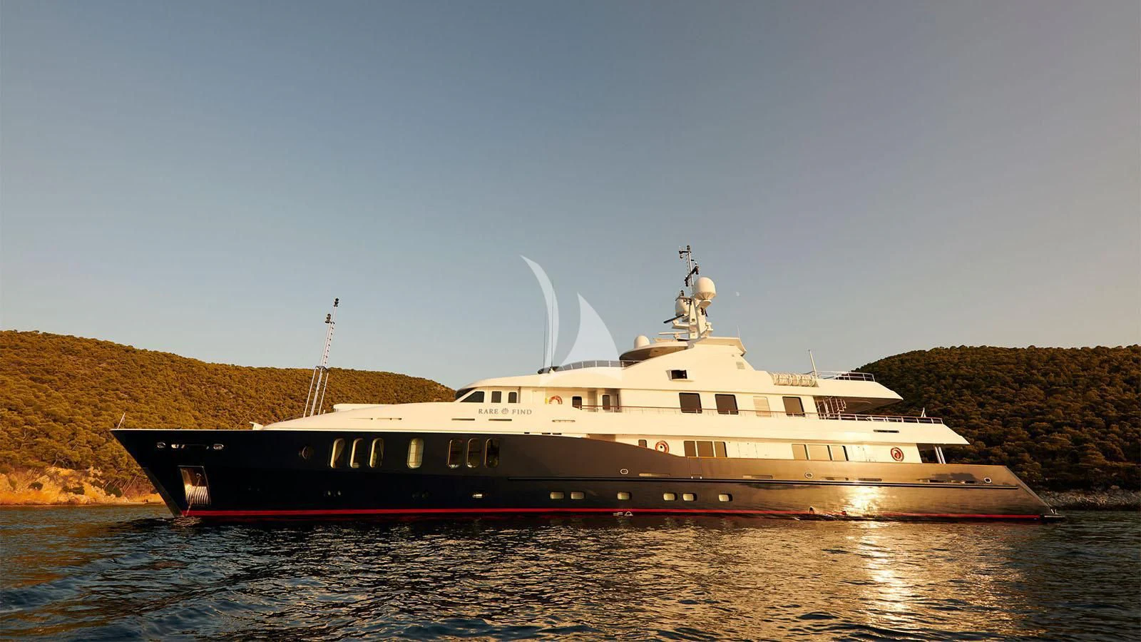 a large boat in the water aboard RARE FIND Yacht for Charter