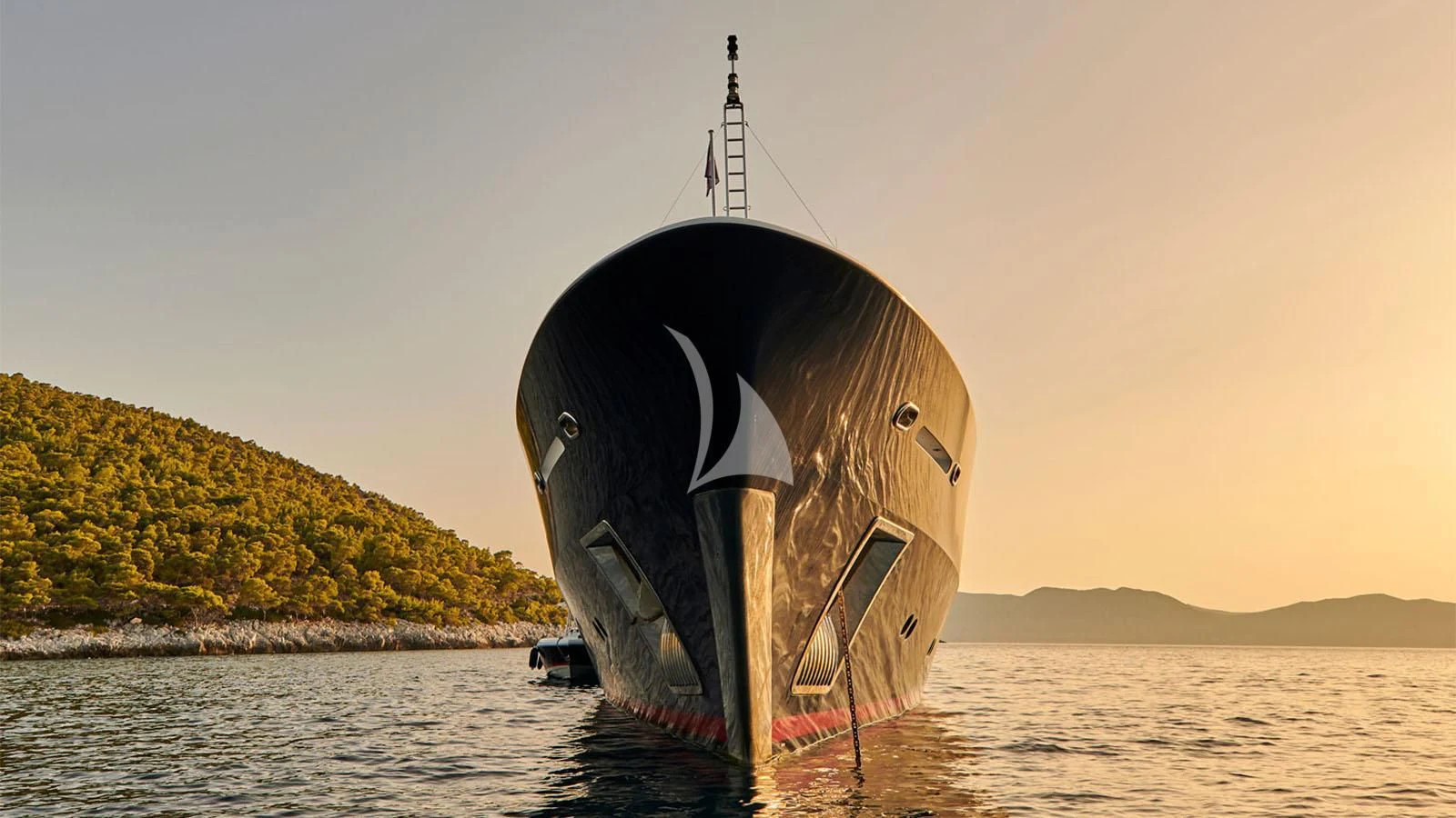 a large submarine in the water aboard RARE FIND Yacht for Charter