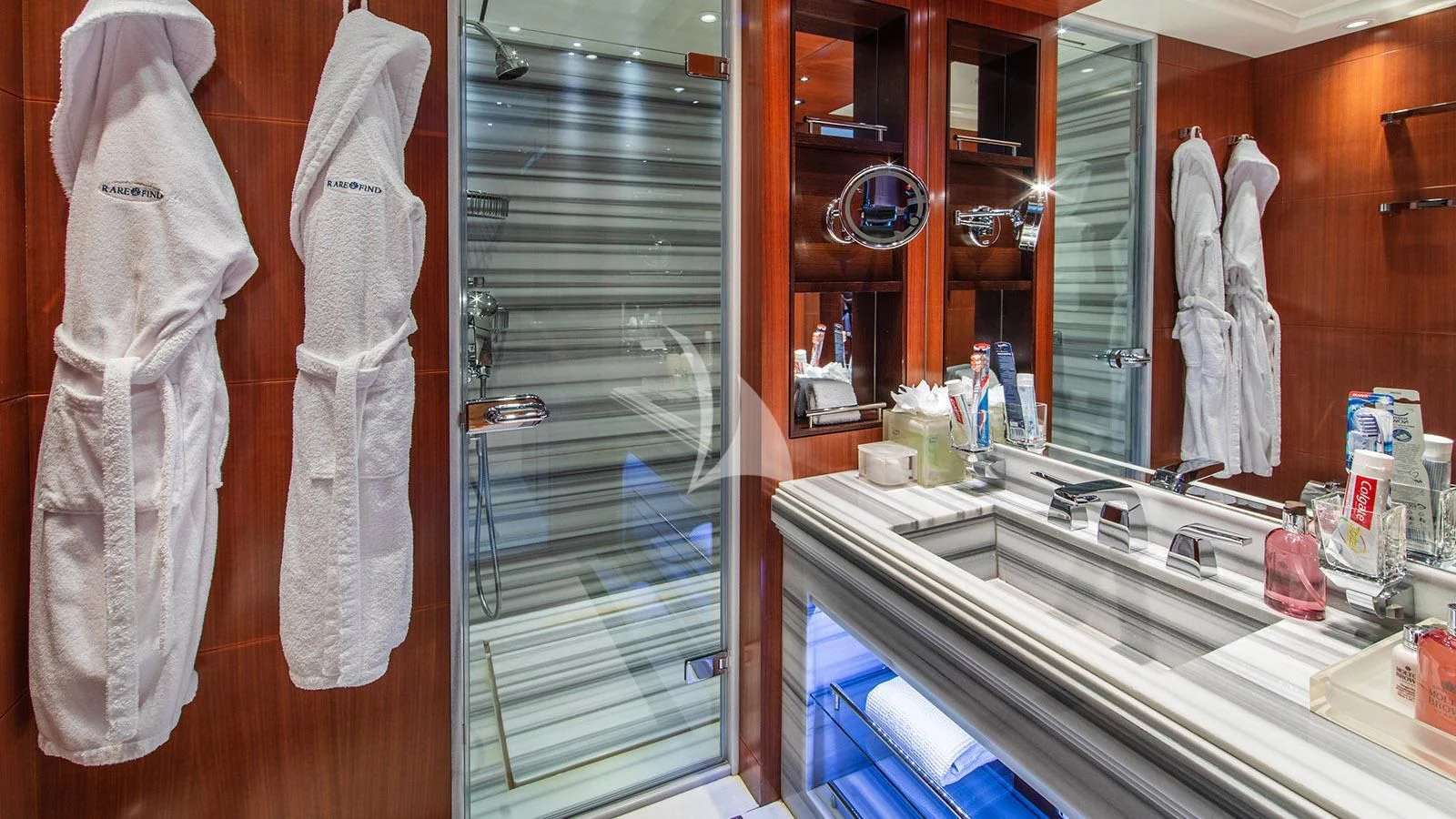 a bathroom with a sink and a mirror aboard RARE FIND Yacht for Charter