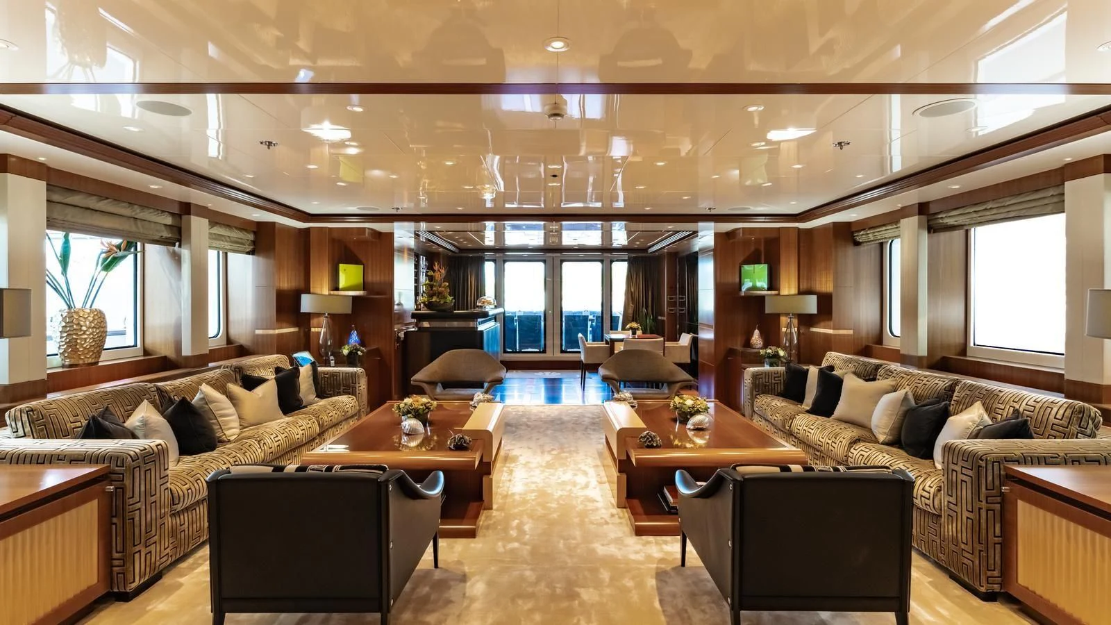 a living room with a large window aboard RARE FIND Yacht for Charter