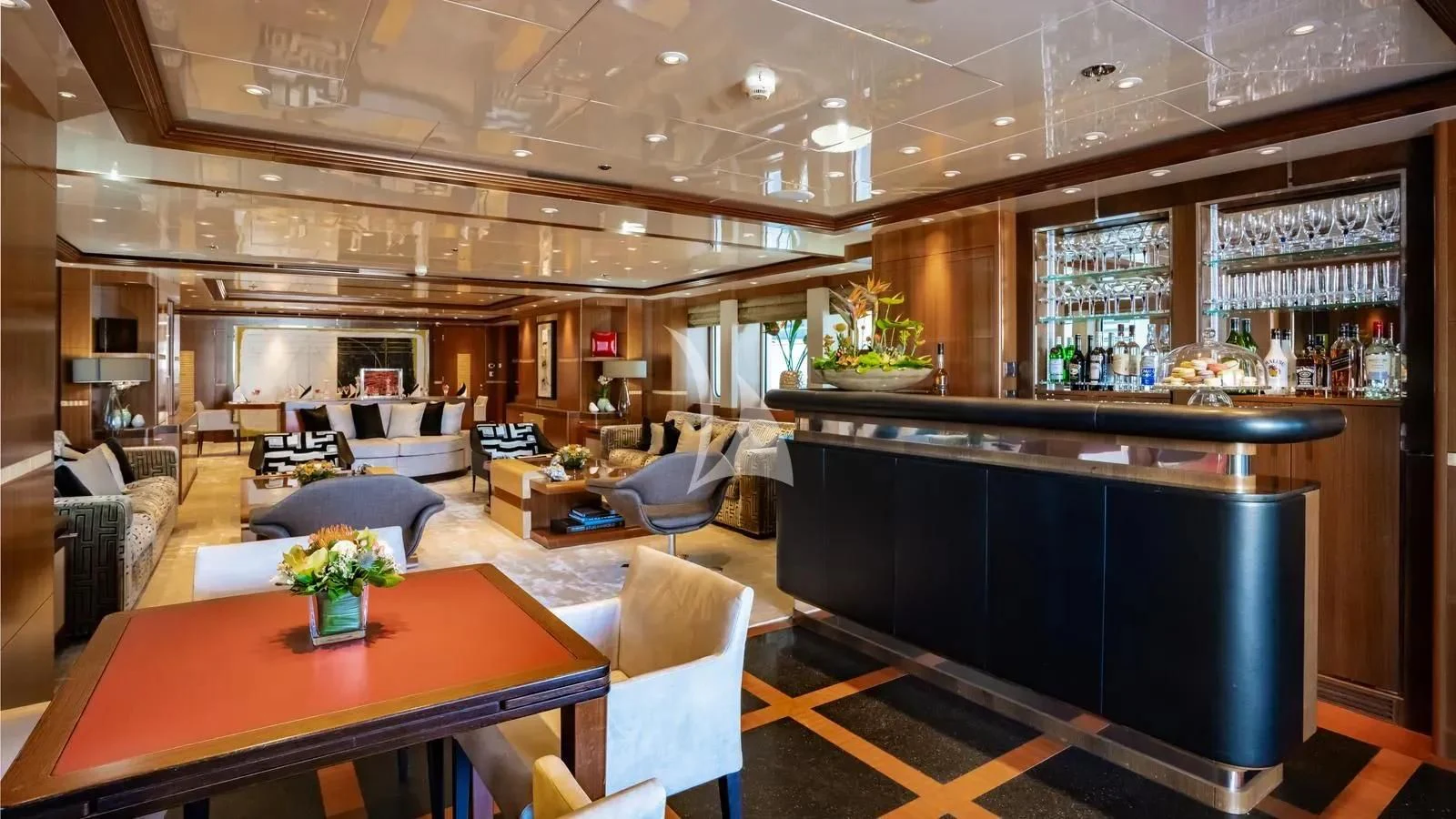 a large kitchen with a bar aboard RARE FIND Yacht for Charter