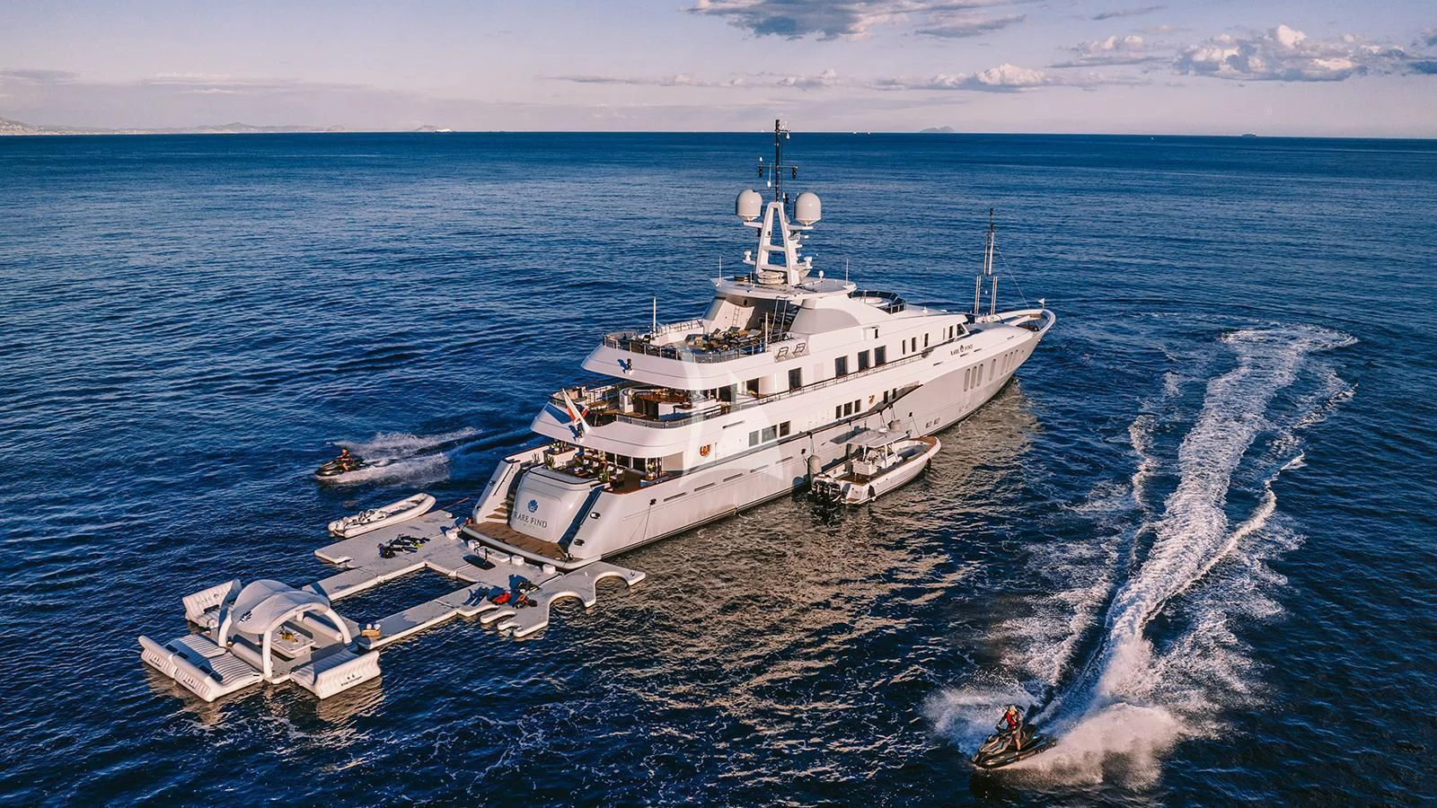 a large ship in the water aboard RARE FIND Yacht for Charter