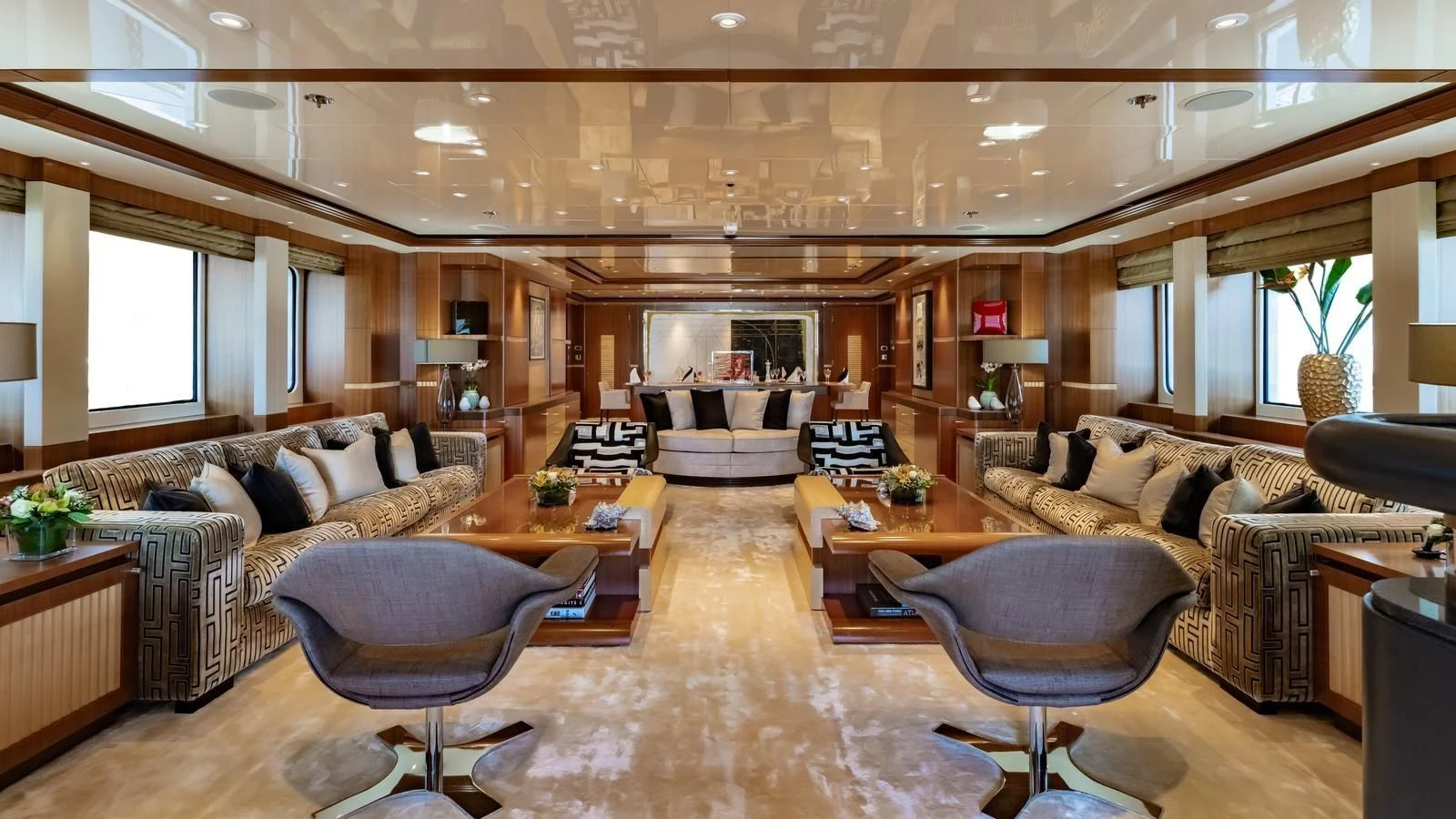 a living room with a couch and a table aboard RARE FIND Yacht for Charter