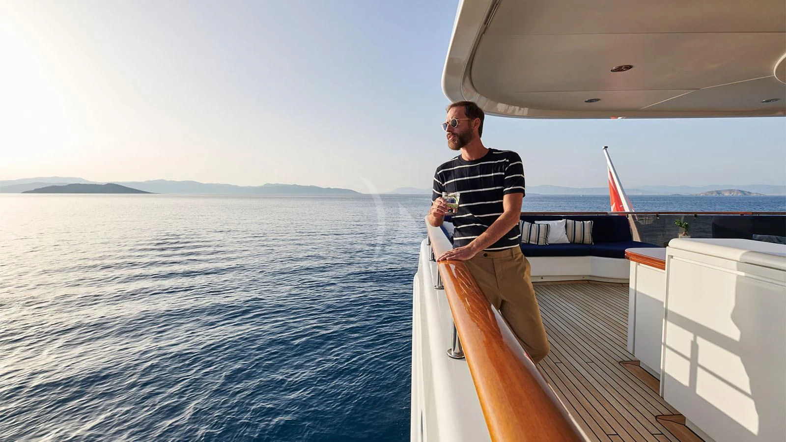 a man standing on a boat aboard RARE FIND Yacht for Charter