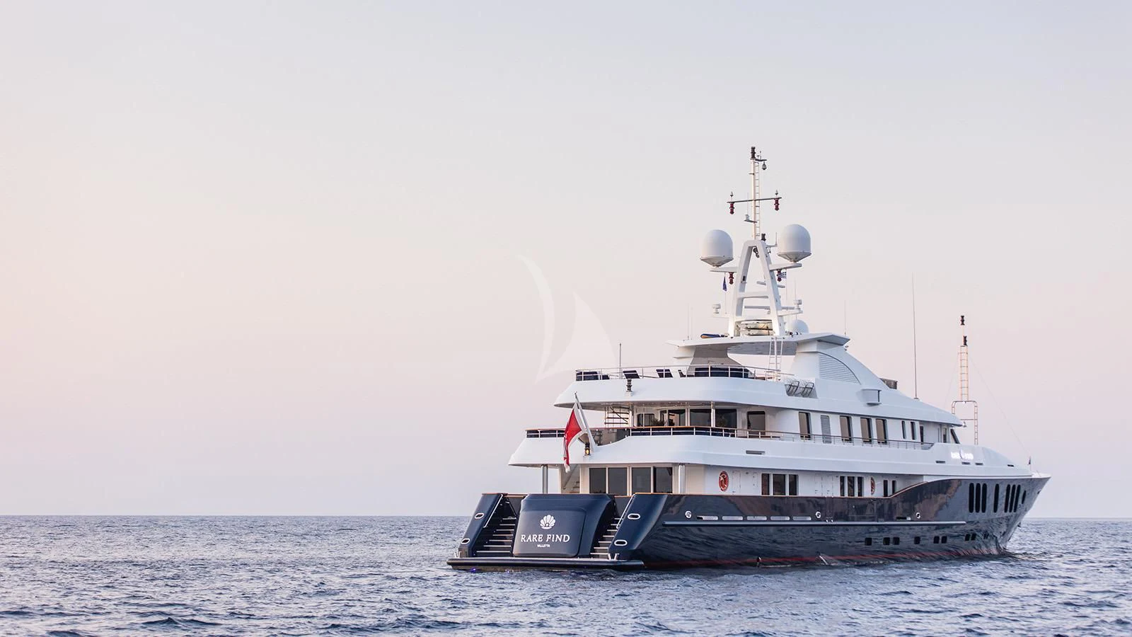 a large boat in the water aboard RARE FIND Yacht for Charter
