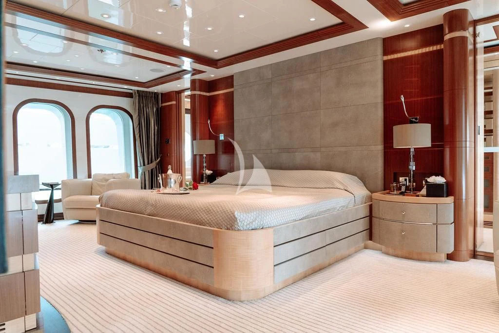 a large bed in a room aboard RARE FIND Yacht for Charter