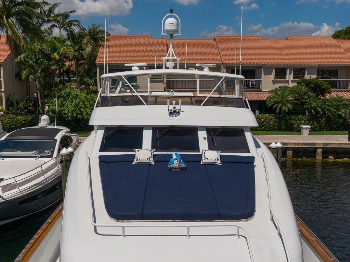 a couple of boats sit in a harbor aboard IMPULSE Yacht for Sale