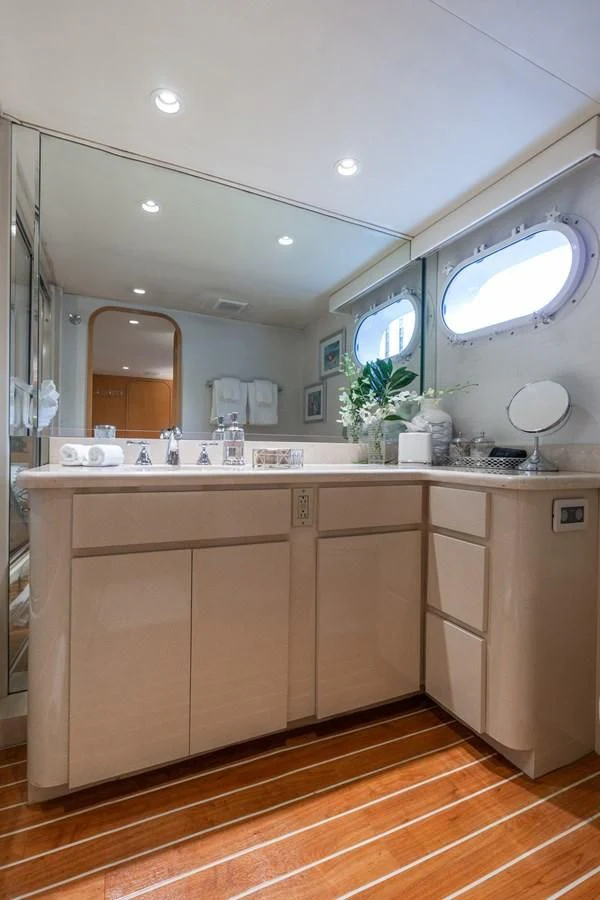 a kitchen with a large mirror aboard IMPULSE Yacht for Sale