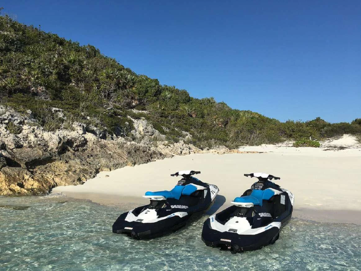 two kayaks on a river aboard IMPULSE Yacht for Sale