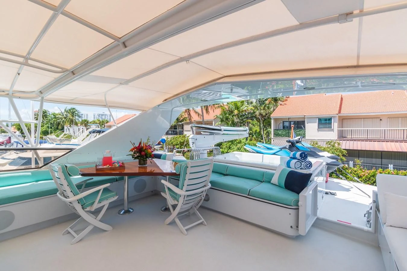 a lounge area with a pool table and chairs aboard IMPULSE Yacht for Sale