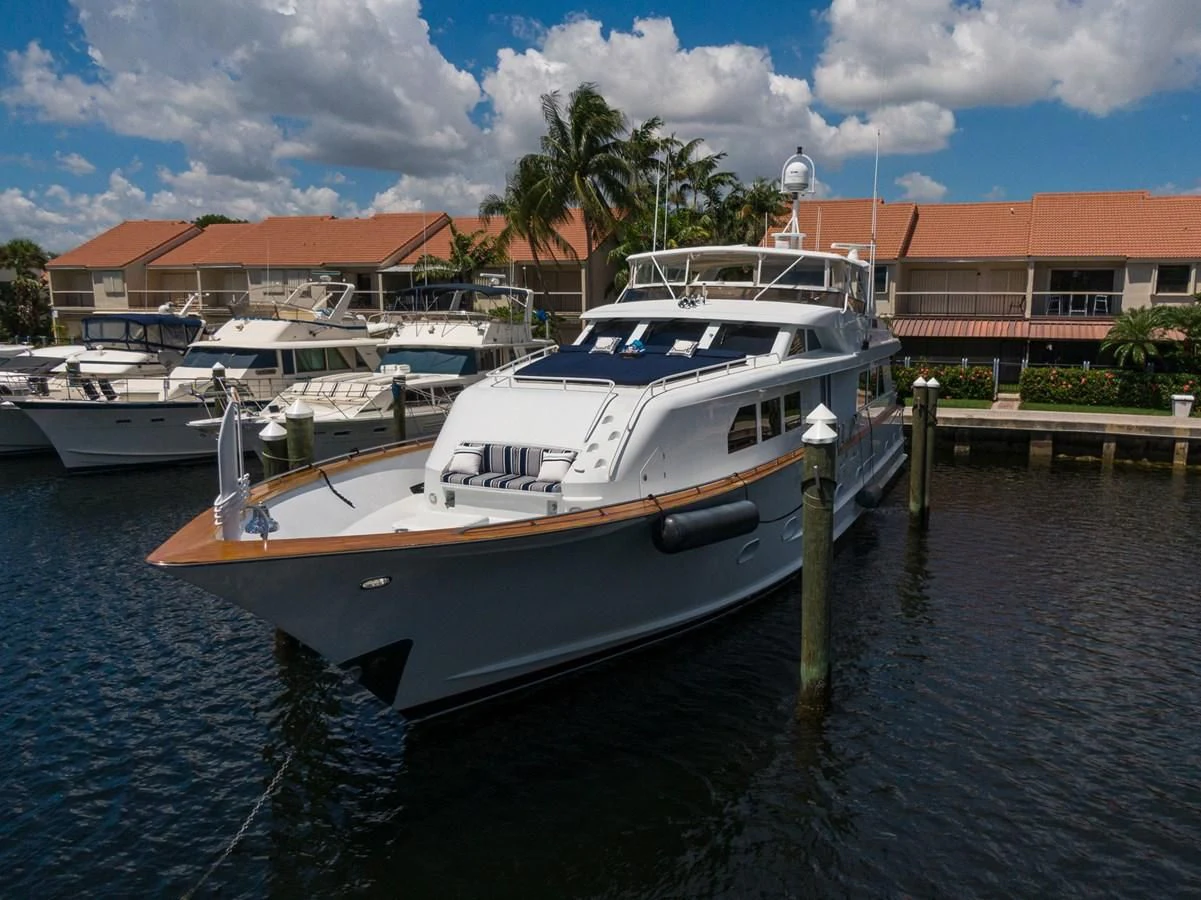 a group of boats are parked in a harbor aboard IMPULSE Yacht for Sale