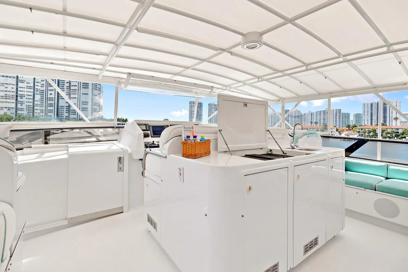 a room with white cabinets and a computer on a desk aboard IMPULSE Yacht for Sale