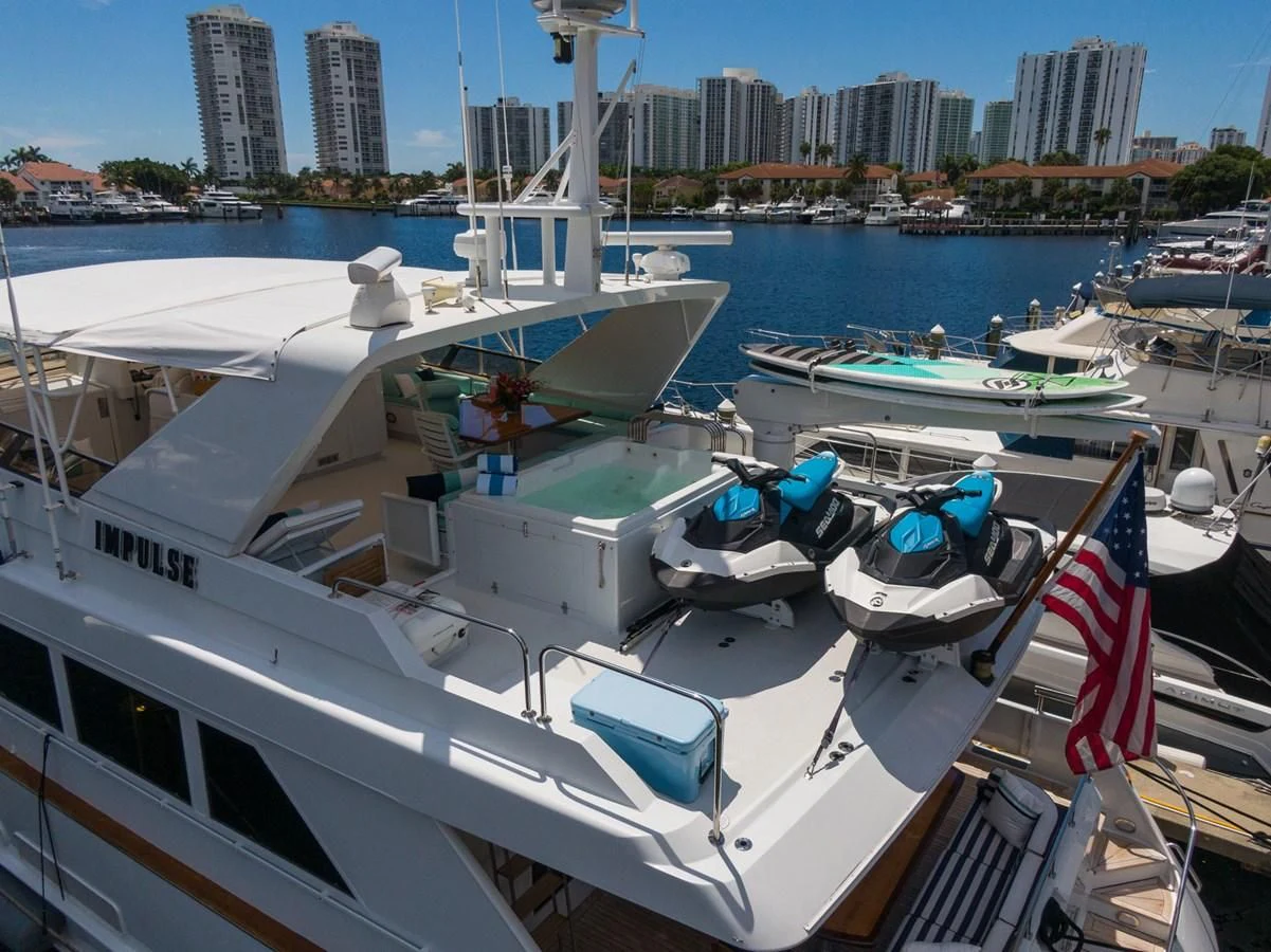 a boat is parked in a harbor aboard IMPULSE Yacht for Sale