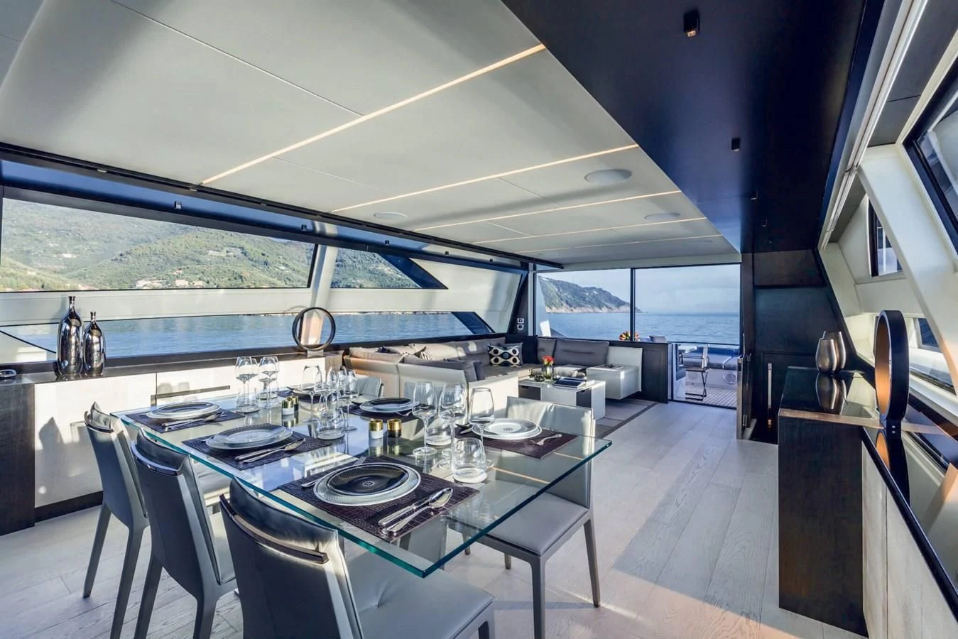 a dining room with a large table aboard STALLION Yacht for Sale