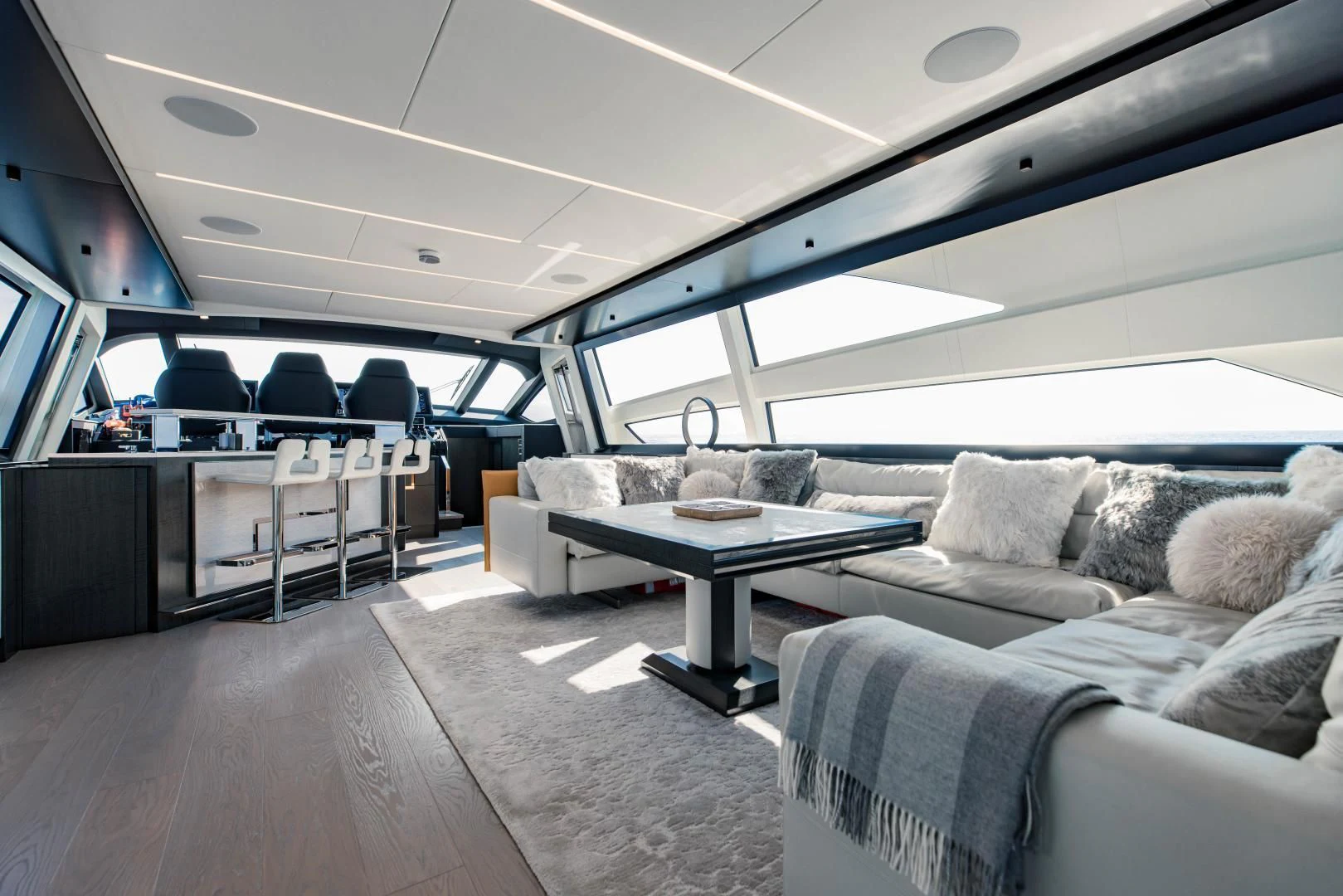 a room with a couch and a table aboard STALLION Yacht for Sale