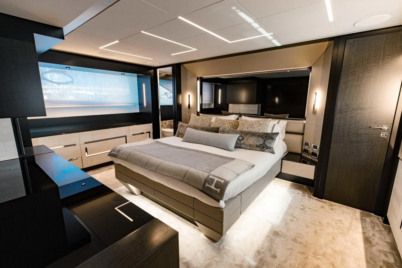 a room with a couch and a tv aboard STALLION Yacht for Sale