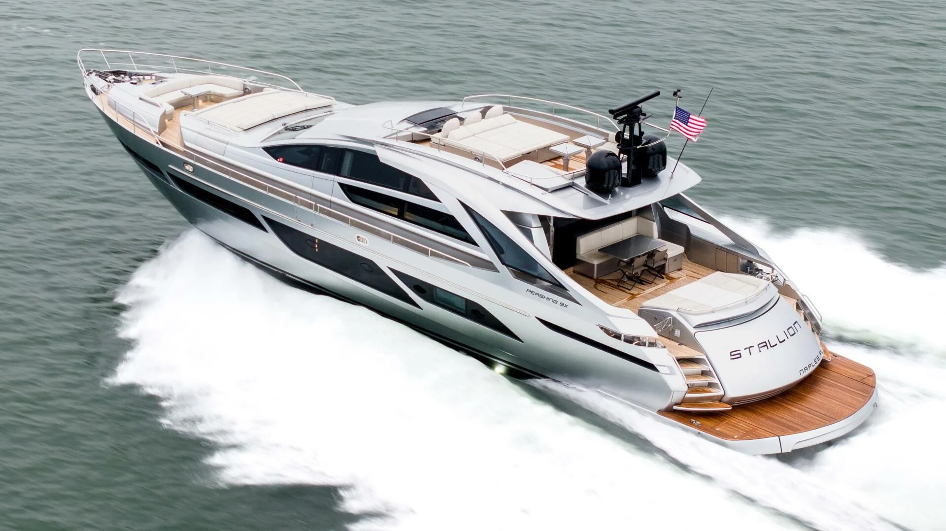 a white boat on water aboard STALLION Yacht for Sale