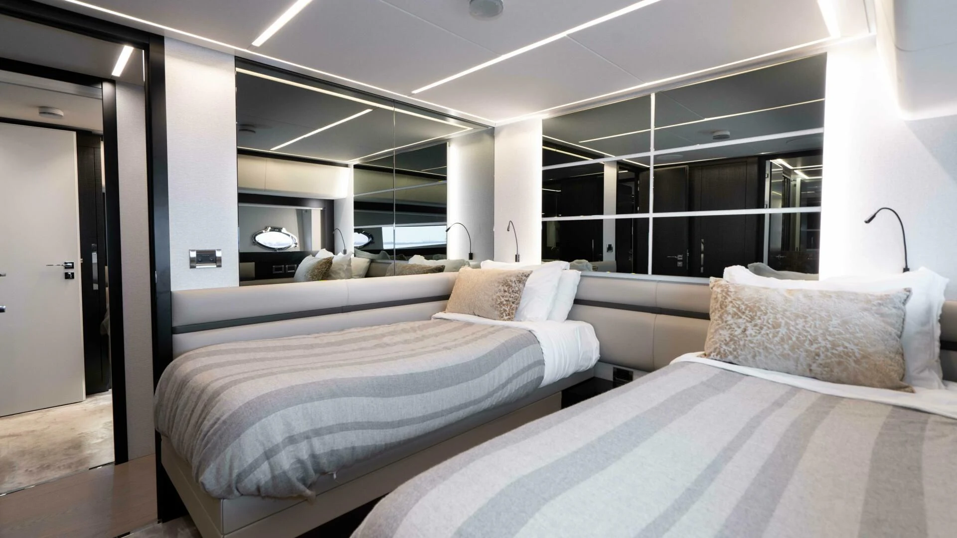 a room with two beds aboard STALLION Yacht for Sale