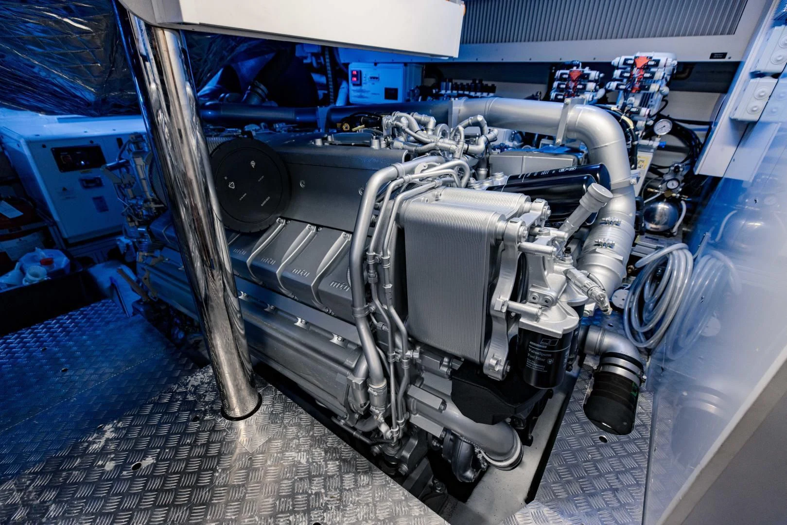 a car with a large engine aboard STALLION Yacht for Sale