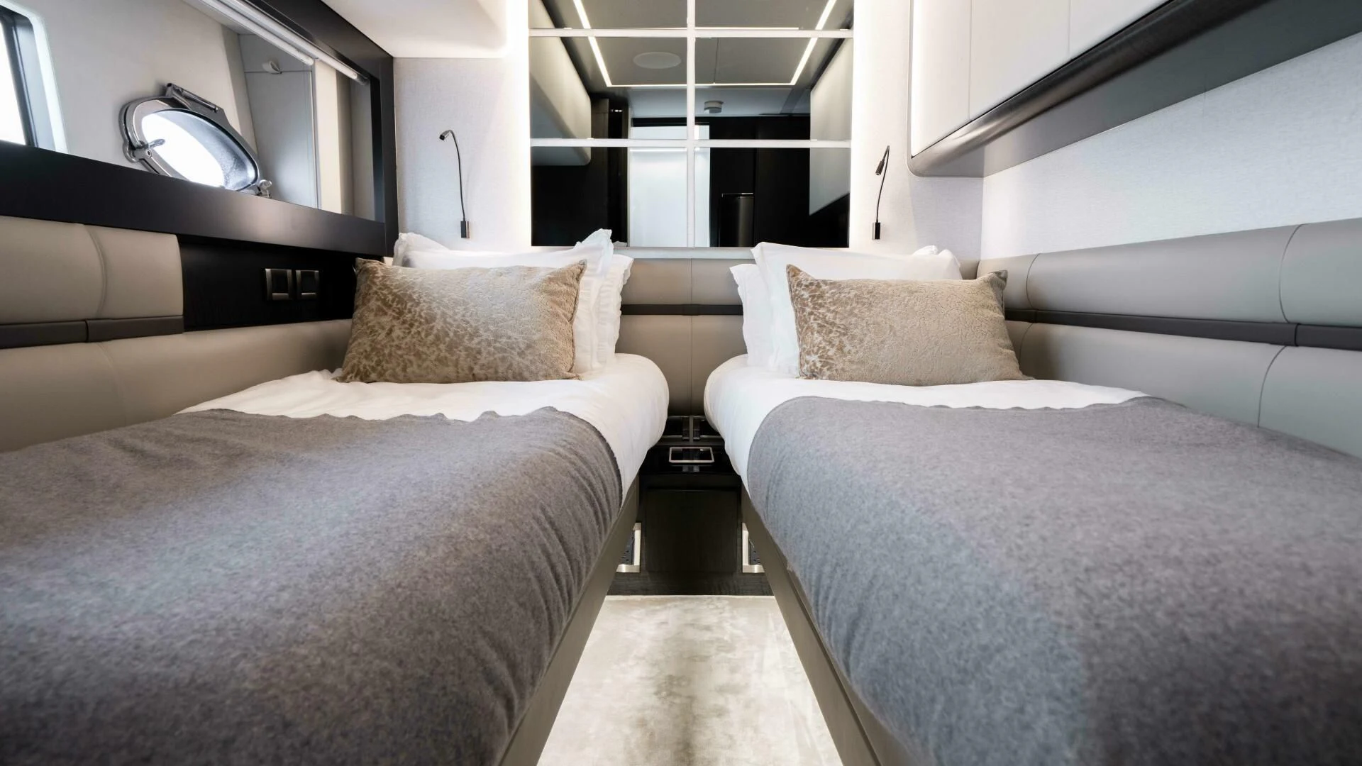 a room with two beds aboard STALLION Yacht for Sale