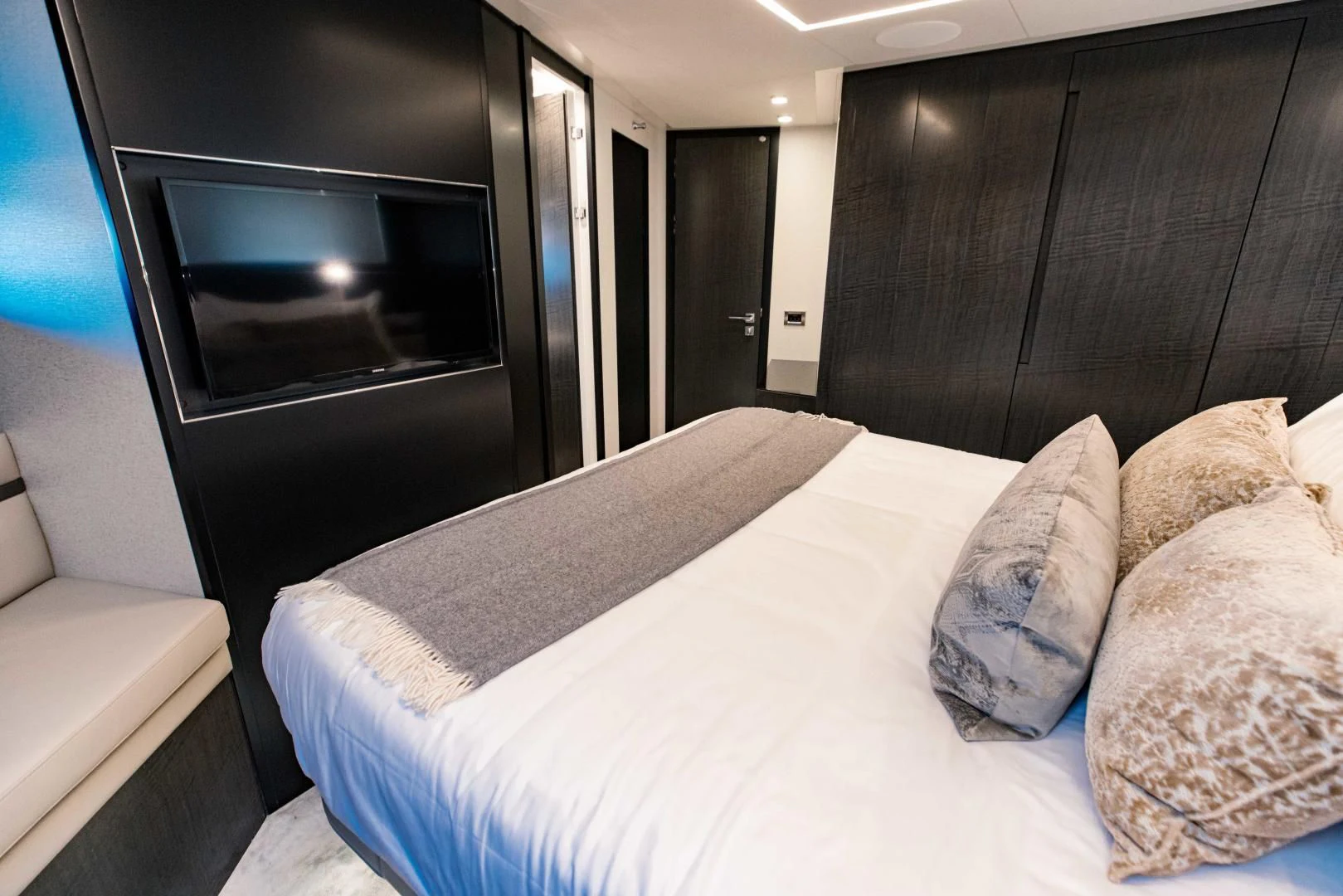 a bed with pillows aboard STALLION Yacht for Sale