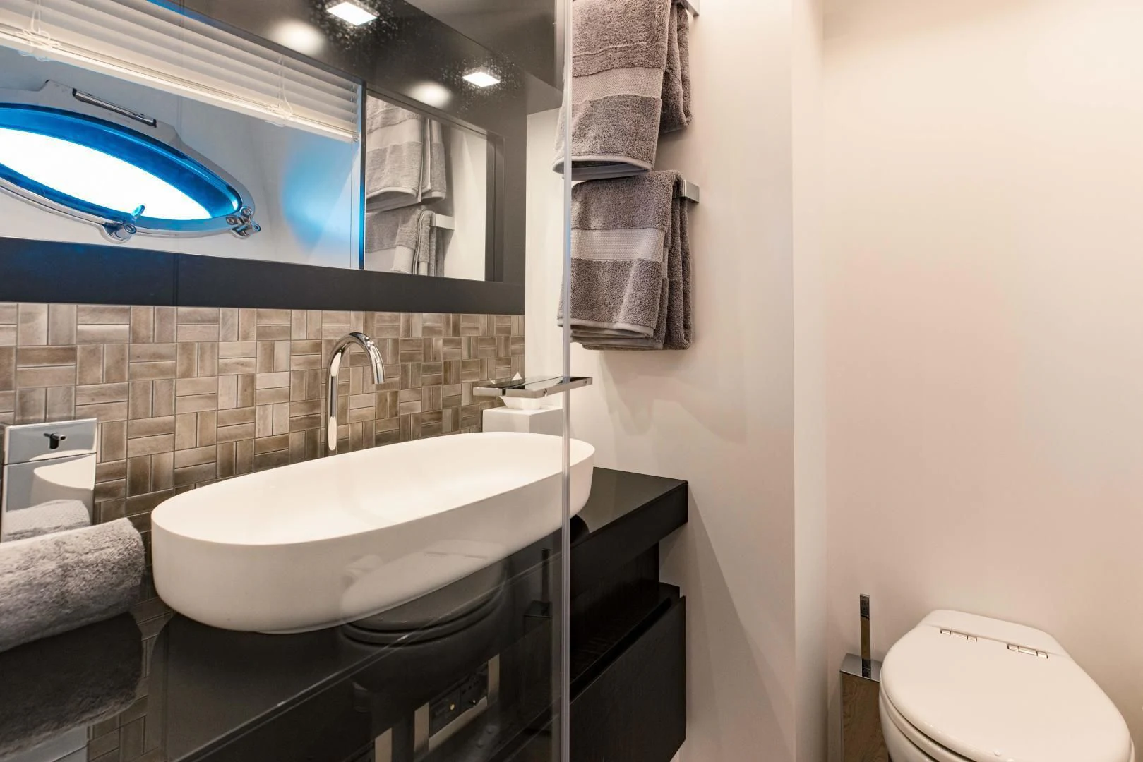 a bathroom with a tub and a sink aboard STALLION Yacht for Sale