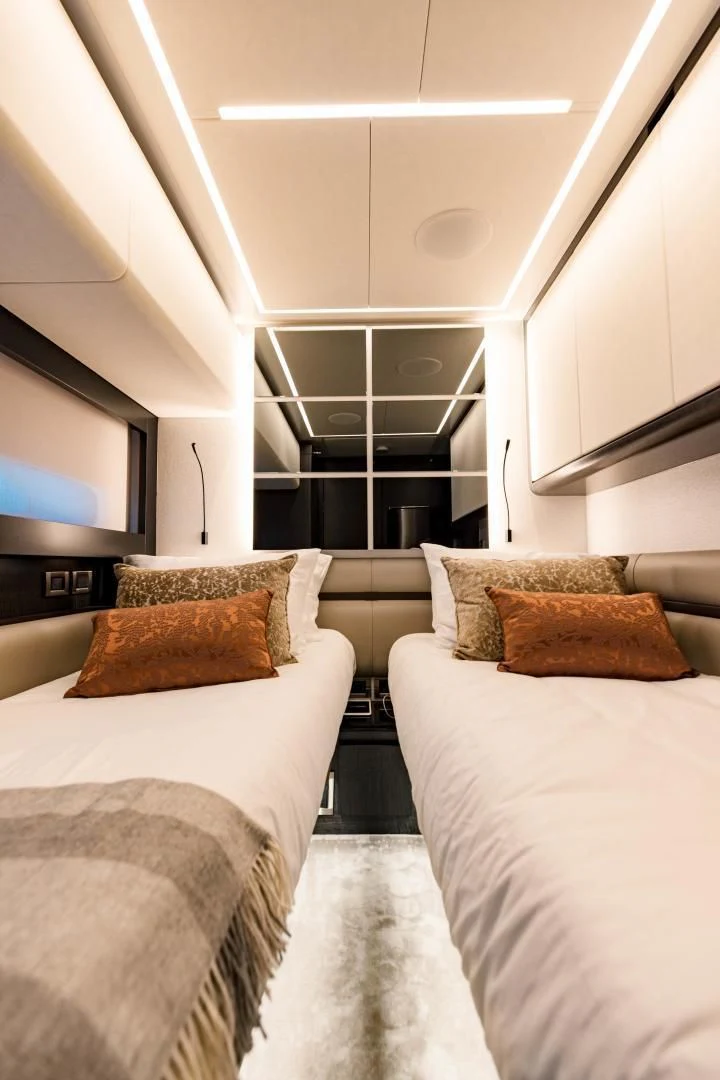 a room with two beds aboard STALLION Yacht for Sale